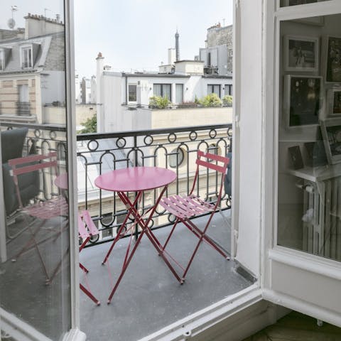 Soak up the Eiffel Tower views from the balcony