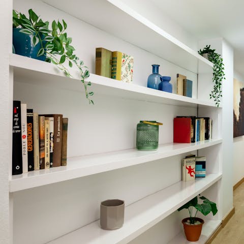 Peruse the bookshelf for some reading material in your downtime