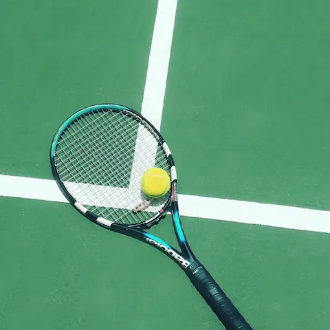 Head to the estate's tennis court for a quick game before a picnic lunch in the gardens