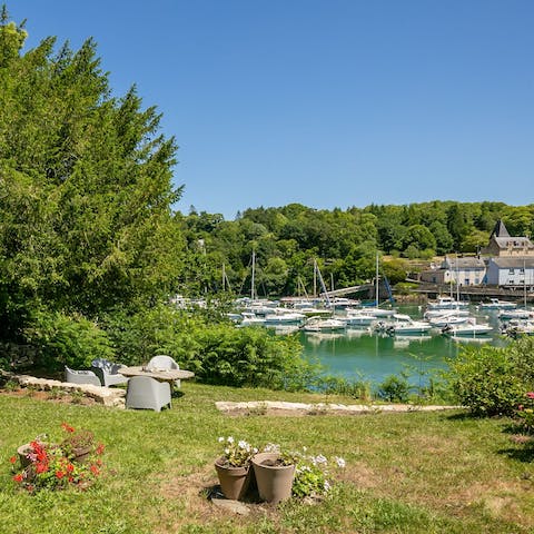 Take in the beautiful views of the river from the pretty garden