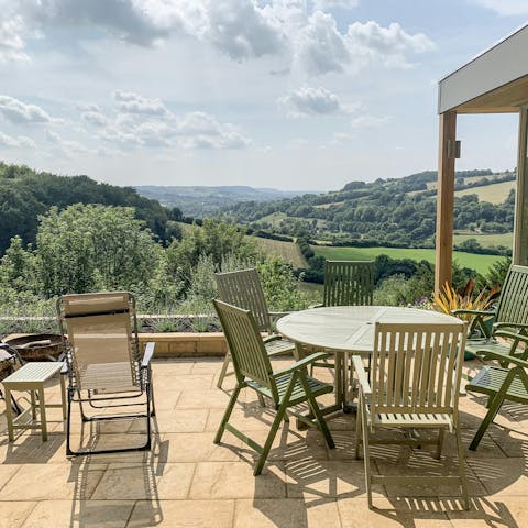 Admire the views over the Cotswold escarpment from the terrace