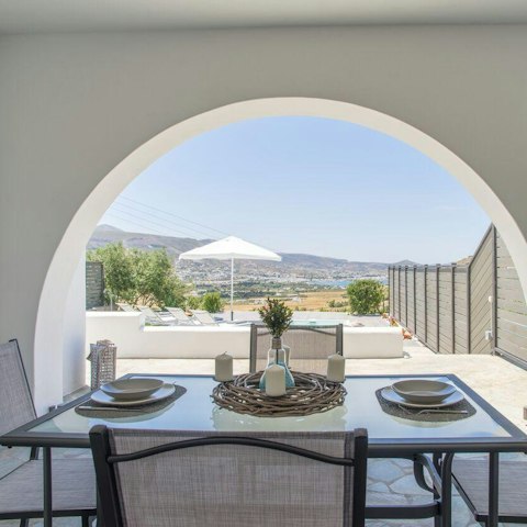 Dine on the covered terrace with a lovely view of the island's varied terrain