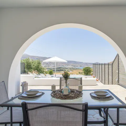Dine on the covered terrace with a lovely view of the island's varied terrain