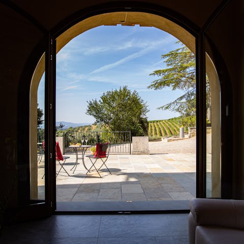 Take in the view of the surrounding countryside from the living room