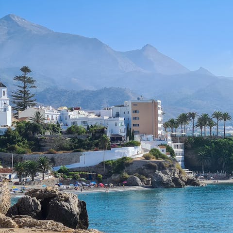 Make your way to Nerja to watch the sunset from Plaza Balcón de Europa