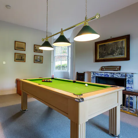 Shoot some pool in the games room