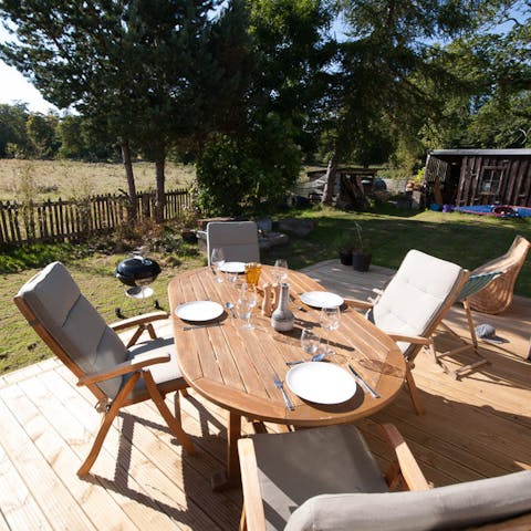 Fire up the barbecue and serve up a delicious grilled feast outside on the deck