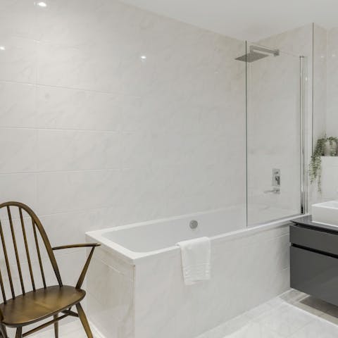 Treat yourself to an uninterrupted hour in the cleansing white bathtub