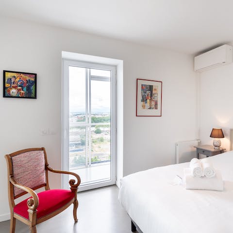 Cosy up with a good book as the sun streams through the large bedroom window