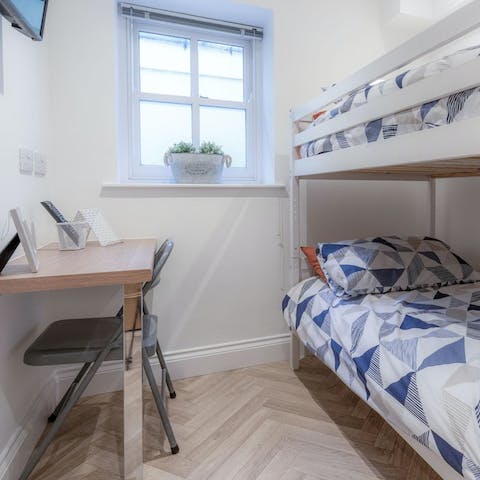 Catch up on work at the second bedroom's desk space