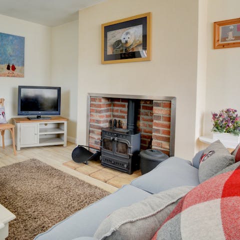 Relax in front of the fire after a day of exploring the Norfolk Coast and Broads