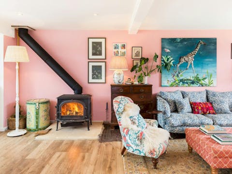 Cosy up by the wood burner after a day exploring the Cotswolds