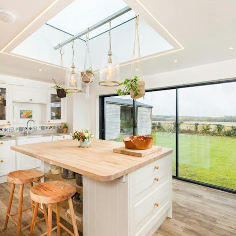 Hop up to the breakfast bar for coffee as you gaze out at the country views