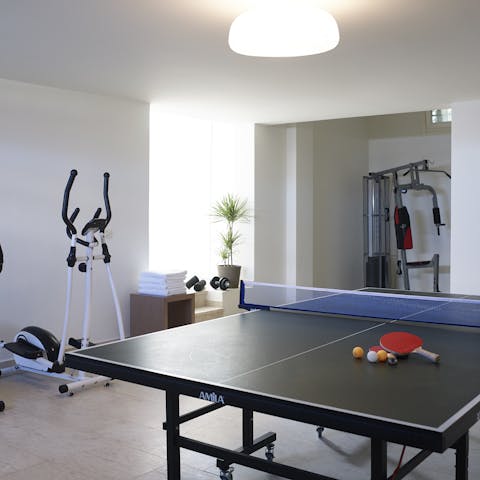 Keep up with your workout routine or play a game of table tennis in the gym, spa and games room