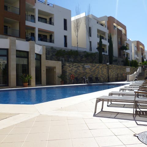 Pad down to the shared swimming pool for a cooling dip