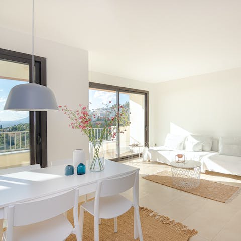 Bask in the streaming sunlight in the open living room