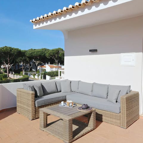 Relax with a good book on the sun-drenched balcony