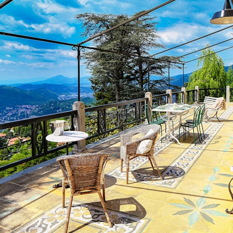 Dine alfresco on the terrace with sweeping views across Lake Como