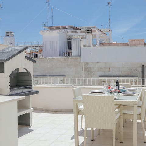 Light the barbecue and enjoy an alfresco meal on the terrace