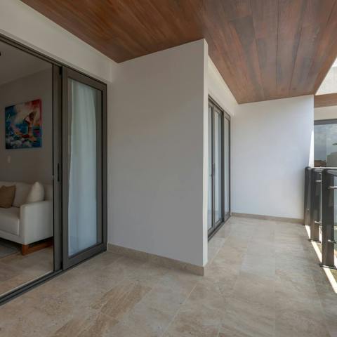 Sip cocktails on the balcony as the sun goes down