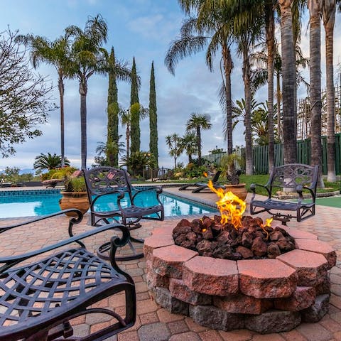 Watch the sun go down as you gather round the fire pit