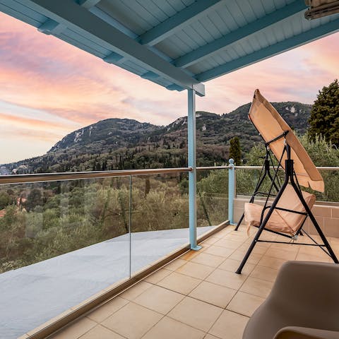 Savour idyllic views of the mountains and sea from the balcony