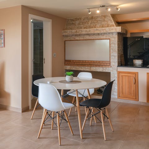 Gather around the dining table for evening drinks and card games