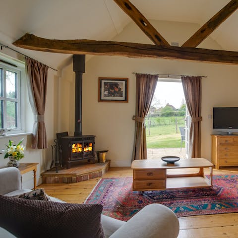 Spend evenings curled up in front of the wood burner