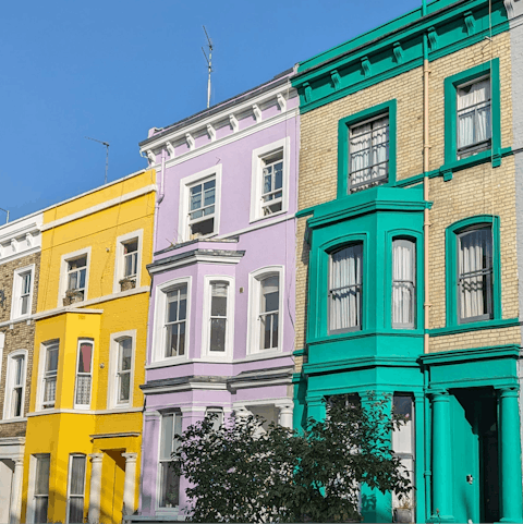 Wander the pastel-hued streets of Notting Hill and hunt for treasures at Portobello Market