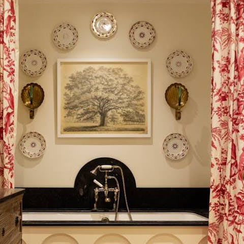 Close the curtains around the bath and enjoy a spa-like experience at home