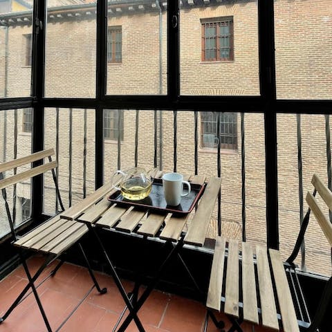 Sip a glass of wine on the covered balcony