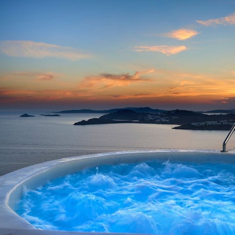 Admire the sunset from the Jacuzzi