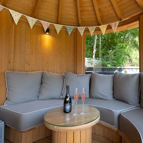 Enjoy a glass of fizz in the heated pavilion