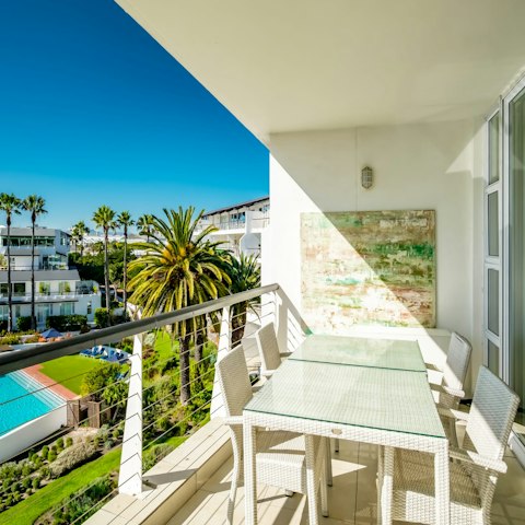 Dine alfresco on the balcony while taking in the scenery