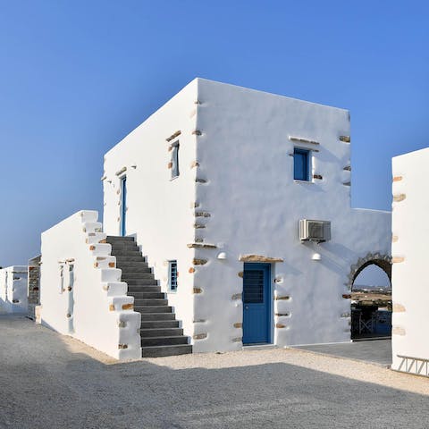 Stay in a traditional home filled with classic features, like stone archways and blue windows