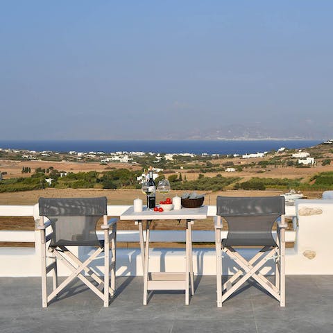 Pour yourself a glass of wine and relax on the terrace, drinking in the ocean views