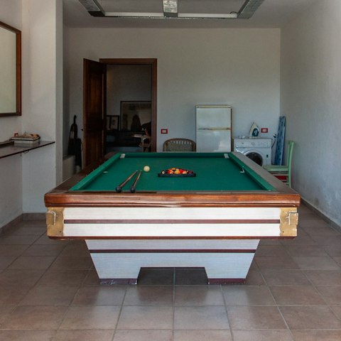 Challenge friends or family to a game of snooker