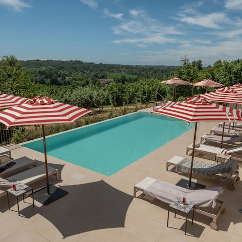 Soak up the countryside view from the private pool