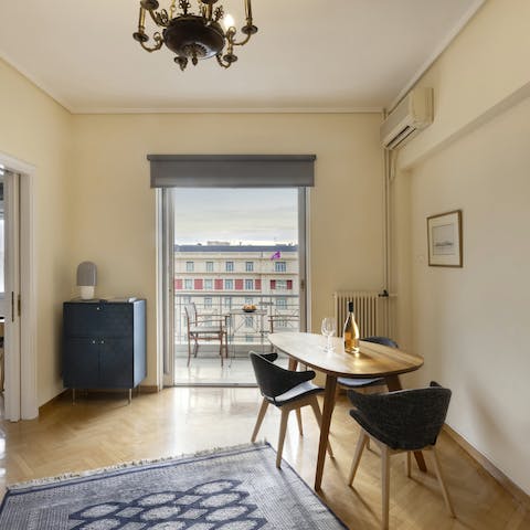 Sip your morning coffee and drink in the view of Athens from your balcony