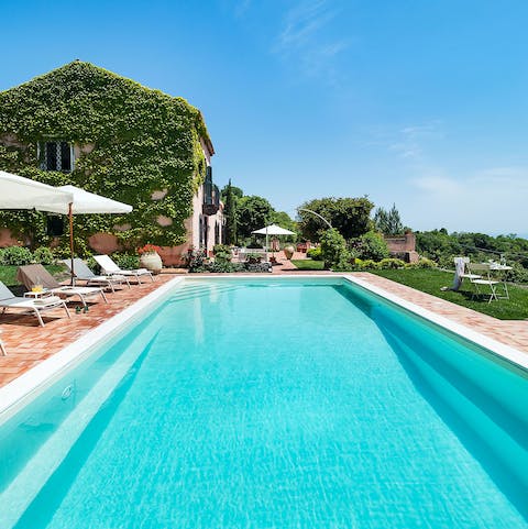 Swim leisurely laps in the large private pool with countryside views
