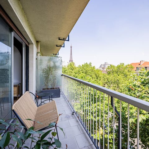 Take in the Fantastic view of the Eiffel Tower from the balcony
