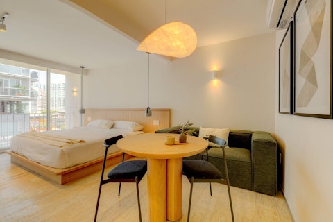 Relax with drinks at home or walk to a local bar