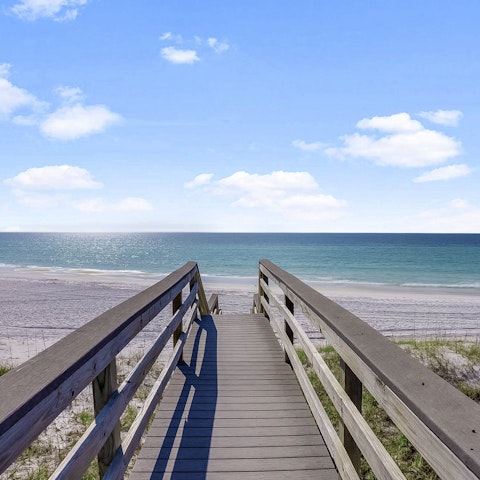 Follow the private boardwalk directly down to Seagrove Beach
