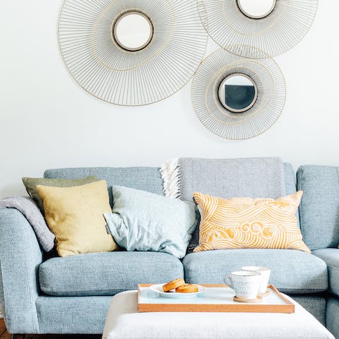 Cosy up on the plush sofa at the end of a full day