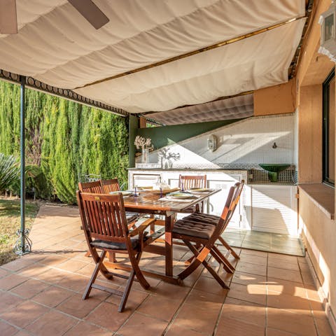 Cook alfresco meals in the outdoor kitchen