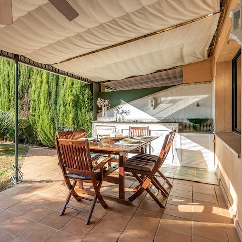 Cook alfresco meals in the outdoor kitchen