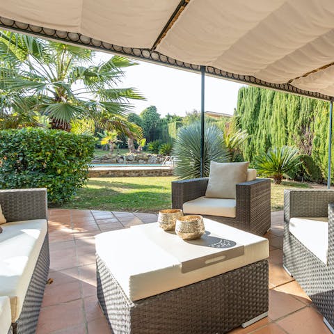 Enjoy sundowners on the shaded patio