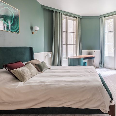 Wake up to sunlight streaming through the French doors