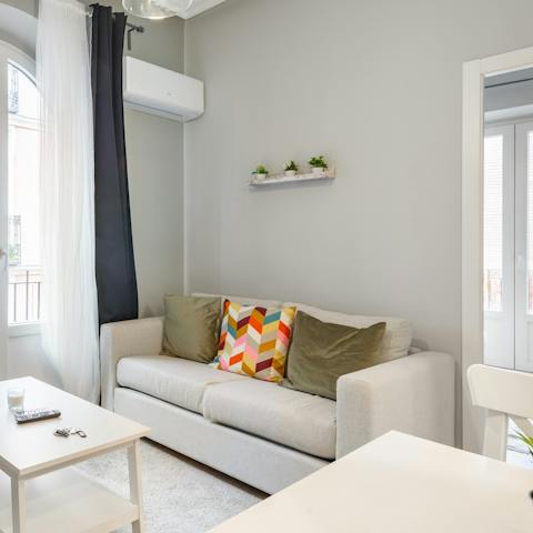 Sink into your sofa after a long day of walking around the city, catching up on your current read