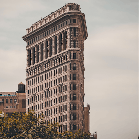 Take some pictures of the Flatiron Building, a ten-minute stroll from this home